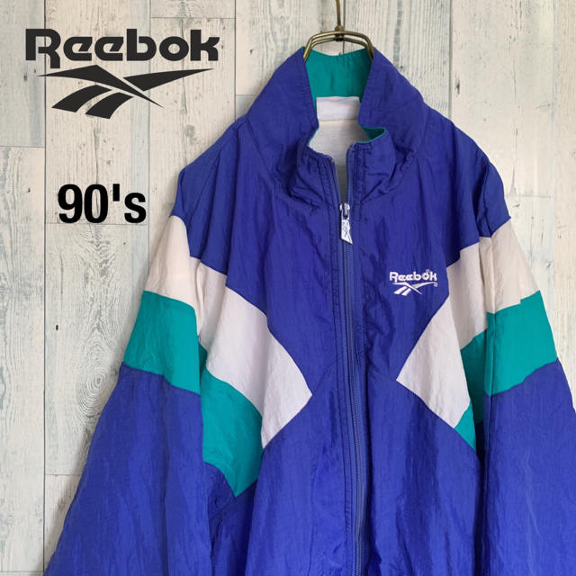 Reebok(リーボック)の90's リーボック ナイロンジャケット 旧タグ ベクターロゴ メンズのジャケット/アウター(ナイロンジャケット)の商品写真