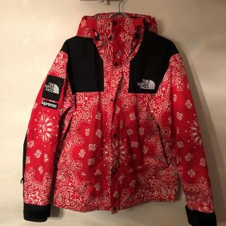 シュプリーム(Supreme)のsupreme × the northface 14aw ペイズリー赤(マウンテンパーカー)