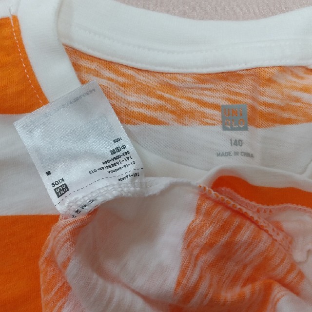 UNIQLO(ユニクロ)のタグ付き新品　UNIQLO　橙ボーダー Tシャツ140 キッズ/ベビー/マタニティのキッズ服男の子用(90cm~)(Tシャツ/カットソー)の商品写真