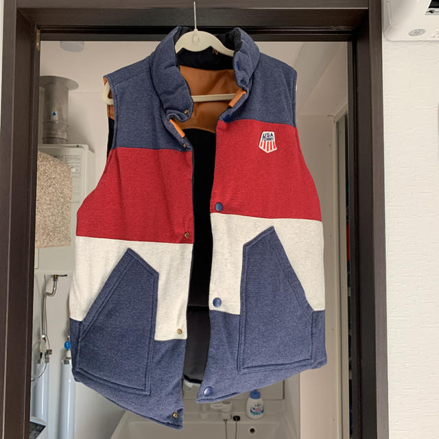 TOMMY(トミー)のトミー ダウンベスト リバーシブル メンズのジャケット/アウター(ダウンベスト)の商品写真