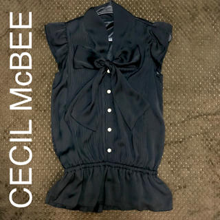 セシルマクビー(CECIL McBEE)のCECIL McBEE リボン付 ブラウス ブラック(シャツ/ブラウス(半袖/袖なし))