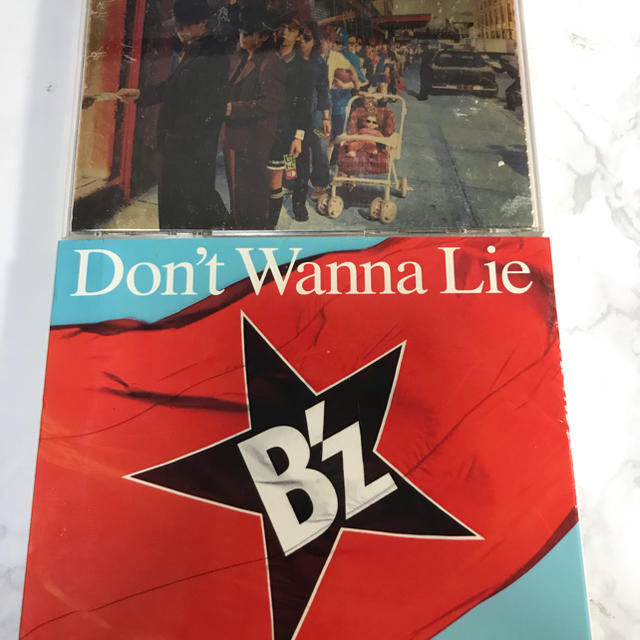 B'z アルバム+シングル 2枚セット エンタメ/ホビーのCD(ポップス/ロック(邦楽))の商品写真