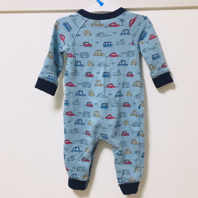 babyGAP(ベビーギャップ)の【約80%オフ】baby GAP 長袖ロンパース ブルー 車 ポケット付き キッズ/ベビー/マタニティのベビー服(~85cm)(ロンパース)の商品写真