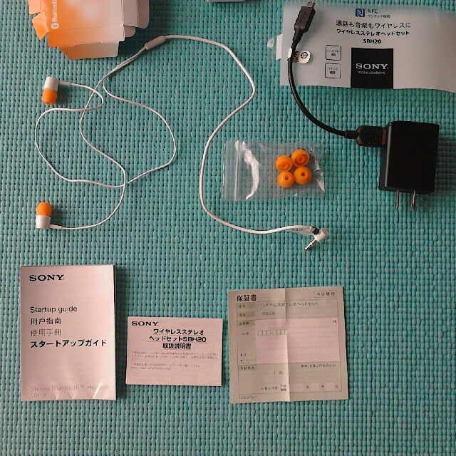 SONY(ソニー)のくまさん専用：SONY ワイヤレスステレオヘッドセット SBH20 オレンジ スマホ/家電/カメラのオーディオ機器(ヘッドフォン/イヤフォン)の商品写真