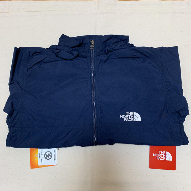 THE NORTH FACE(ザノースフェイス)の新品 ノースフェイス キッズ コンパクトジャケット ネイビー 150cm キッズ/ベビー/マタニティのキッズ服男の子用(90cm~)(ジャケット/上着)の商品写真