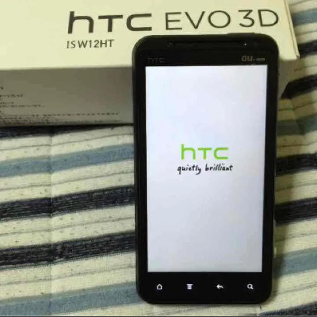 HTC(ハリウッドトレーディングカンパニー)のHTC EVO 3D  ISW12HT  au スマホ スマホ/家電/カメラのスマートフォン/携帯電話(スマートフォン本体)の商品写真