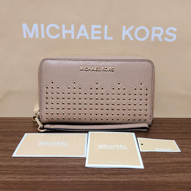 Michael Kors(マイケルコース)の新品☆MICHEL KORS　ピンクベージュ　パンチング　長財布　 正規品 ❤︎ レディースのファッション小物(財布)の商品写真
