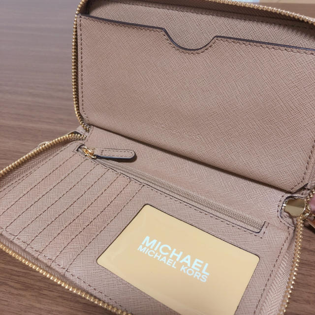 Michael Kors(マイケルコース)の新品☆MICHEL KORS　ピンクベージュ　パンチング　長財布　 正規品 ❤︎ レディースのファッション小物(財布)の商品写真