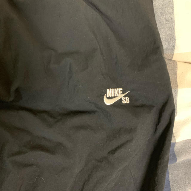 NIKE(ナイキ)のNIKE SB トラックパンツ XL メンズのパンツ(サルエルパンツ)の商品写真