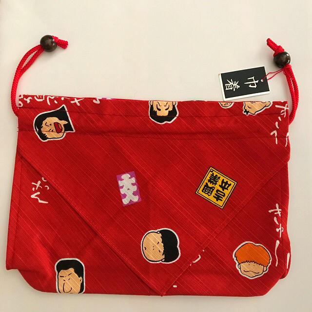 新品／吉本新喜劇キャラクター 巾着 お弁当包み（赤） エンタメ/ホビーのタレントグッズ(お笑い芸人)の商品写真