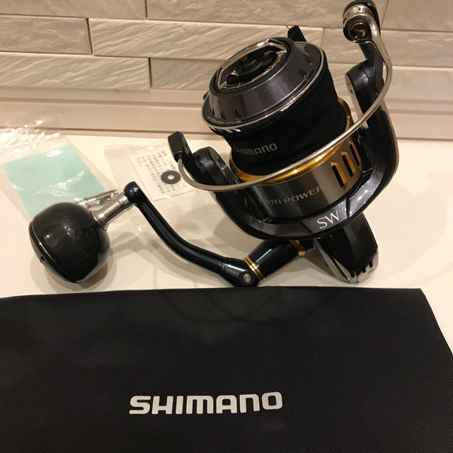SHIMANO(シマノ)のまさまさ様専用 シマノ ツインパワー  SW 8000 PG  美品 スポーツ/アウトドアのフィッシング(リール)の商品写真