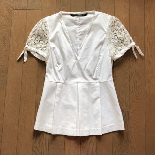 ザラ(ZARA)のZARA ペプラムトップス ブラウス 春物 完売(シャツ/ブラウス(半袖/袖なし))