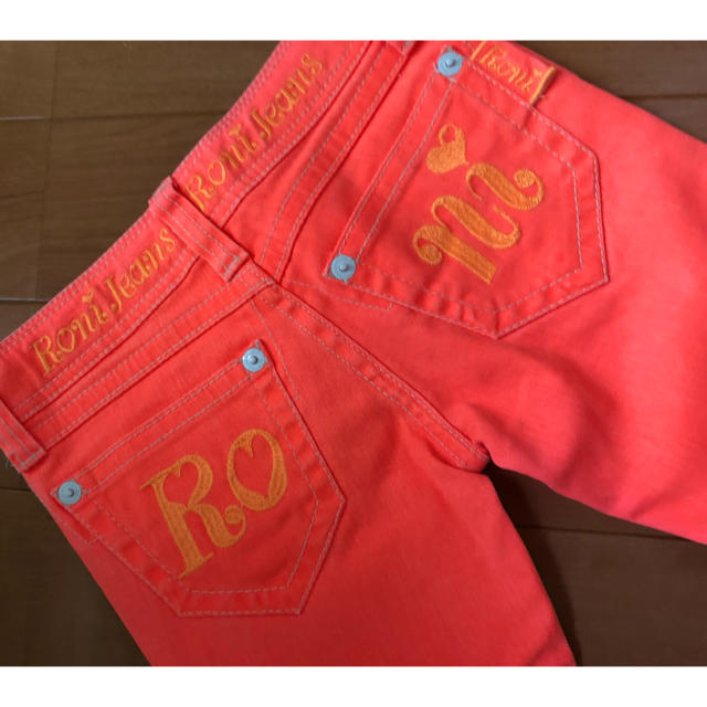 RONI(ロニィ)のRONI 新品未使用 オレンジスキニーパンツ七分丈 23～24 キッズ/ベビー/マタニティのキッズ服女の子用(90cm~)(パンツ/スパッツ)の商品写真