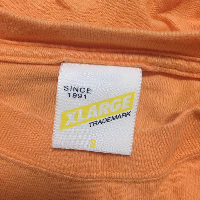 XLARGE(エクストララージ)のXLARGE オレンジ Tシャツ メンズのトップス(Tシャツ/カットソー(半袖/袖なし))の商品写真