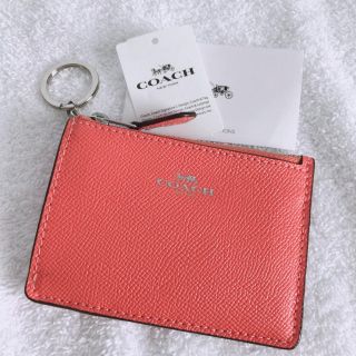 コーチ(COACH)の新品COACH キーリング付きパスケース コーラルオレンジ(名刺入れ/定期入れ)