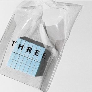 スリー(THREE)のTHREE 限定品 リップ クリアバッグ付き(リップグロス)