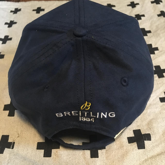 BREITLING(ブライトリング)の【希少 非売品】BREITLINGキャップ (紺 x 黄刺繍) メンズの帽子(キャップ)の商品写真