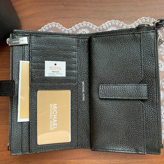 Michael Kors(マイケルコース)のMICHEAL KORS フローラルリスレット 長財布！ レディースのファッション小物(財布)の商品写真