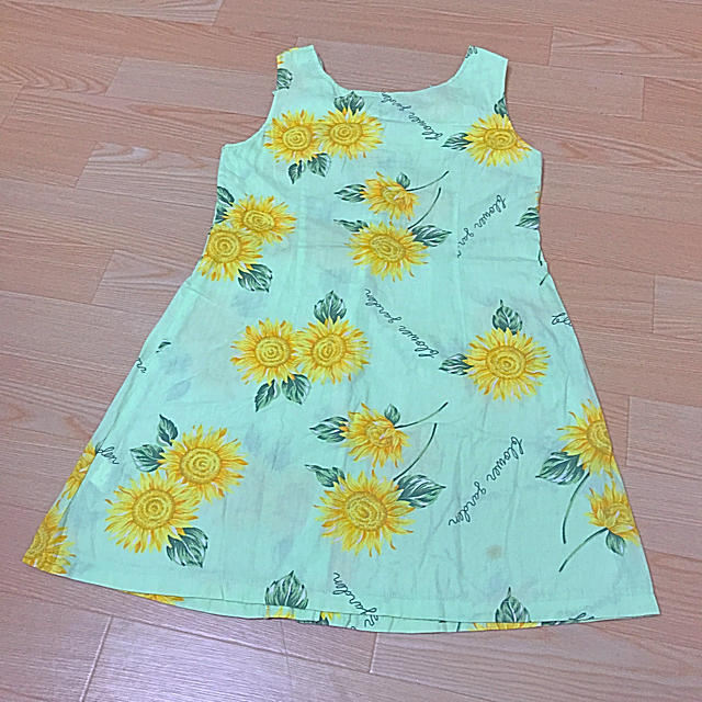 marimekko(マリメッコ)のマリメッコ 140 ワンピース 盛夏服 ライトグリーン 向日葵  キッズ/ベビー/マタニティのキッズ服女の子用(90cm~)(ワンピース)の商品写真