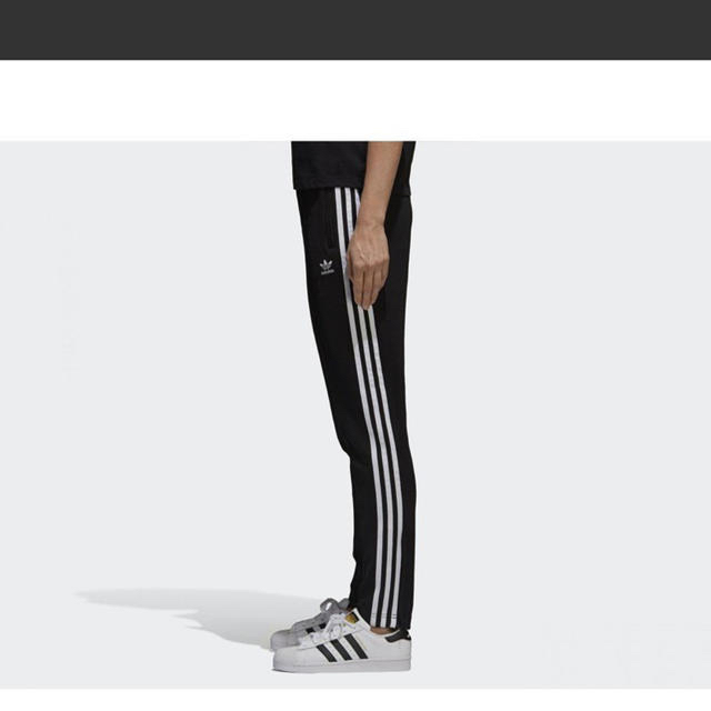 adidas(アディダス)のadidas トラックパンツ mサイズ レディースのパンツ(スキニーパンツ)の商品写真