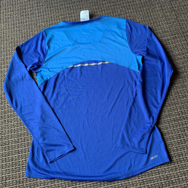 New Balance(ニューバランス)のrak様専用出品ニューバランス  長袖Tシャツ DRYウエア Mサイズ  スポーツ/アウトドアのトレーニング/エクササイズ(トレーニング用品)の商品写真