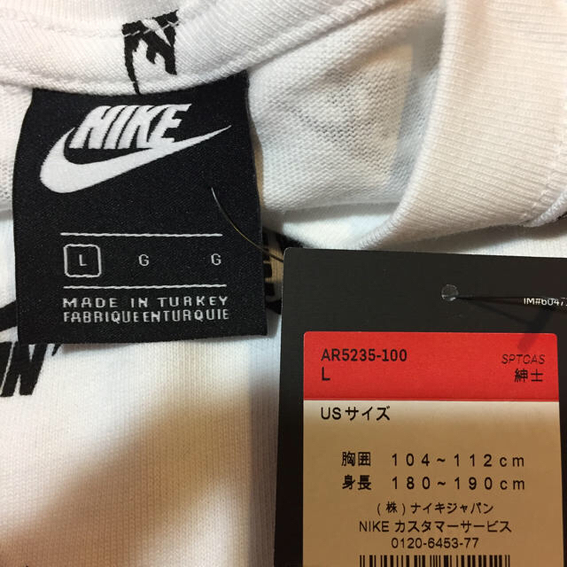 NIKE(ナイキ)のNIKE ナイキ オーバーサイズ ロングTシャツ ホワイト US Lサイズ レディースのトップス(Tシャツ(半袖/袖なし))の商品写真