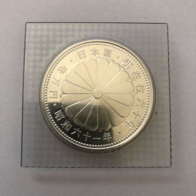 天皇陛下御在位60年記念 1万円銀貨-