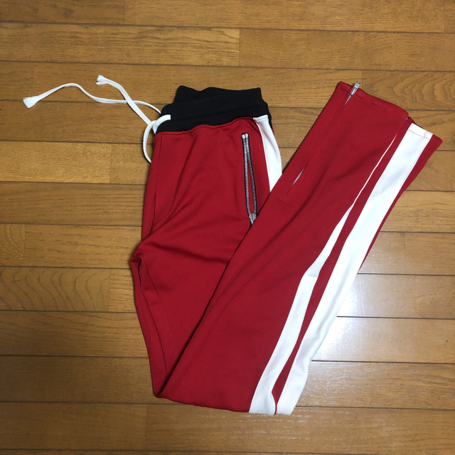 FEAR OF GOD(フィアオブゴッド)の［justin 着用］fear of god track pants red メンズのパンツ(その他)の商品写真