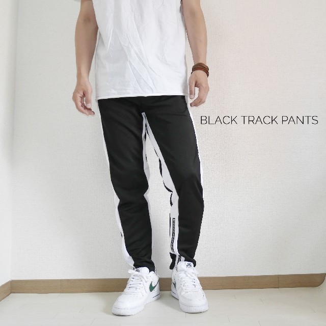 black トラックパンツ ジャージ ジョガーパンツ メンズのパンツ(サルエルパンツ)の商品写真