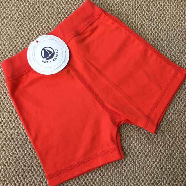 PETIT BATEAU(プチバトー)の新品(18m/81㎝)■プチバトー/PETITBATEAU■オレンジパンツ キッズ/ベビー/マタニティのベビー服(~85cm)(パンツ)の商品写真