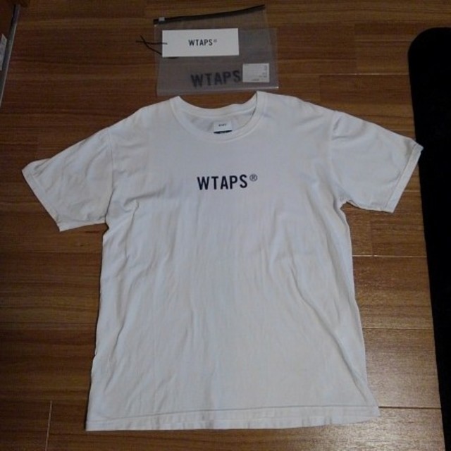 W)taps(ダブルタップス)のW)taps ダブルタップス ロゴTシャツ 白 Ｌサイズ タグ ジッパー付属品付 メンズのトップス(Tシャツ/カットソー(半袖/袖なし))の商品写真