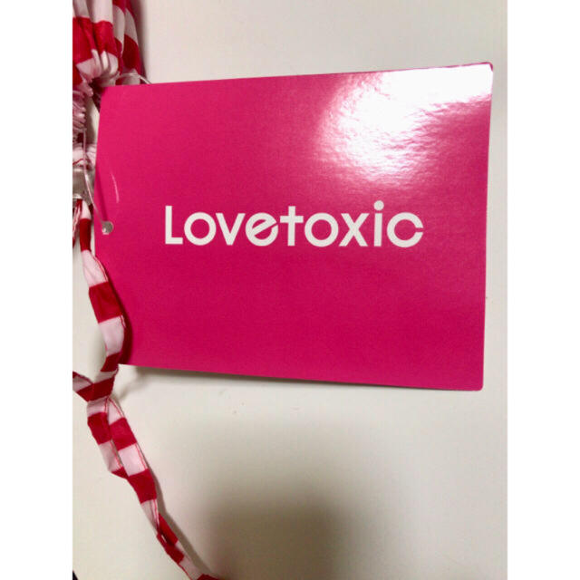lovetoxic(ラブトキシック)の6 新品タグ付き Lovetoxic レインパーカー  キッズ/ベビー/マタニティのこども用ファッション小物(レインコート)の商品写真