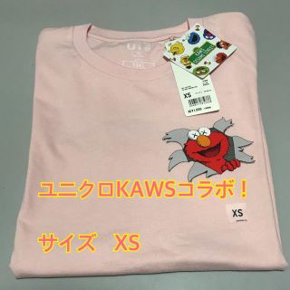 ユニクロ(UNIQLO)のUNIQLO Kaws 半袖Tシャツ ピンク(Tシャツ/カットソー(半袖/袖なし))