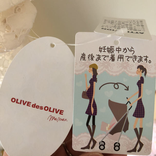 OLIVEdesOLIVE(オリーブデオリーブ)のOLIVE des OLIVE 白のワンピース 新品タグ付き キッズ/ベビー/マタニティのマタニティ(マタニティワンピース)の商品写真