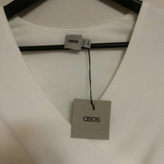 asos(エイソス)の値下げ asos ペプラムトップス 新品 レディースのトップス(カットソー(半袖/袖なし))の商品写真