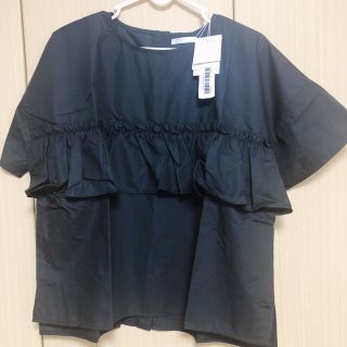 メルロー(merlot)の未使用 フリルデザイン後ろボタンシャツ(シャツ/ブラウス(半袖/袖なし))