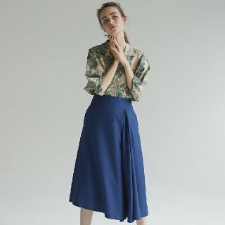 ノートエシロンス(note et silence)のebonyivory pleated skirts(ひざ丈スカート)