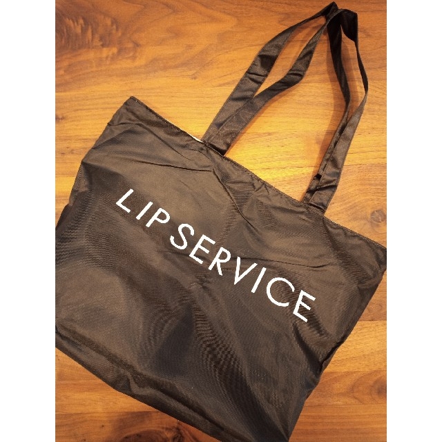 LIP SERVICE(リップサービス)のLIP SERVICE 花柄＆ブラック リバーシブルBAG レディースのバッグ(トートバッグ)の商品写真