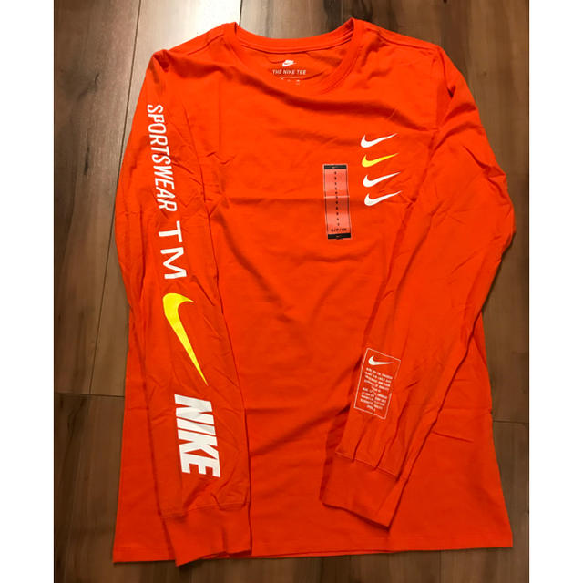 NIKE(ナイキ)の【US:Mサイズ】NIKE ナイキ スポーツウェア NSW ロンT オレンジ メンズのトップス(Tシャツ/カットソー(七分/長袖))の商品写真