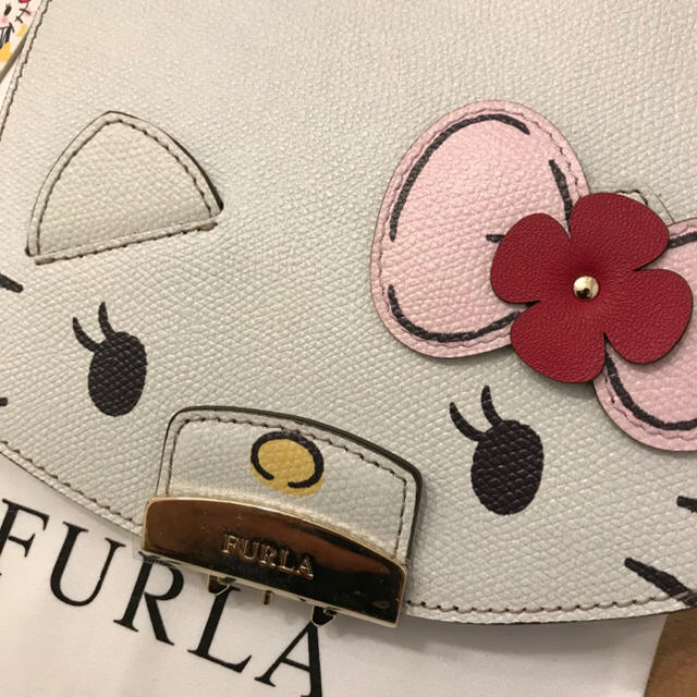 Furla(フルラ)のぐでちゃん様専用  FURLA フルラ KITTY キティ フラップ レディースのバッグ(ショルダーバッグ)の商品写真