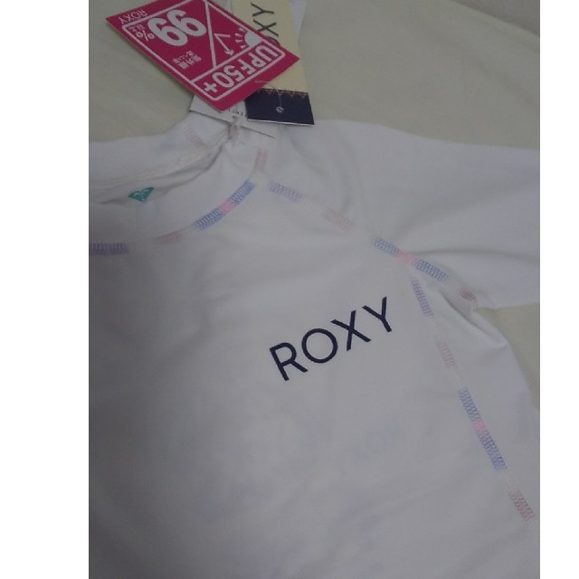 Roxy(ロキシー)の専用です。新品タグつき！ラッシュガードとパンツ　100 キッズ/ベビー/マタニティのキッズ服女の子用(90cm~)(水着)の商品写真