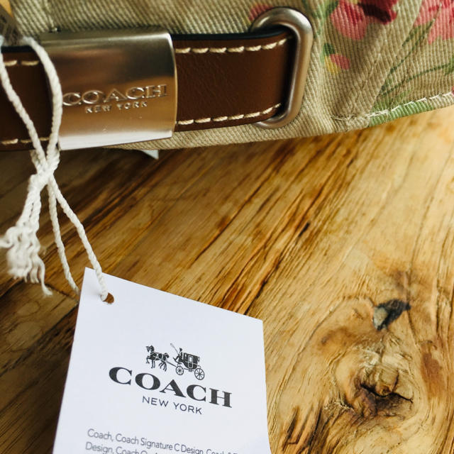 COACH(コーチ)の【新品未使用】コーチ 花柄 フラワープリント キャップ 帽子 ※コーチ紙袋付き レディースの帽子(キャップ)の商品写真