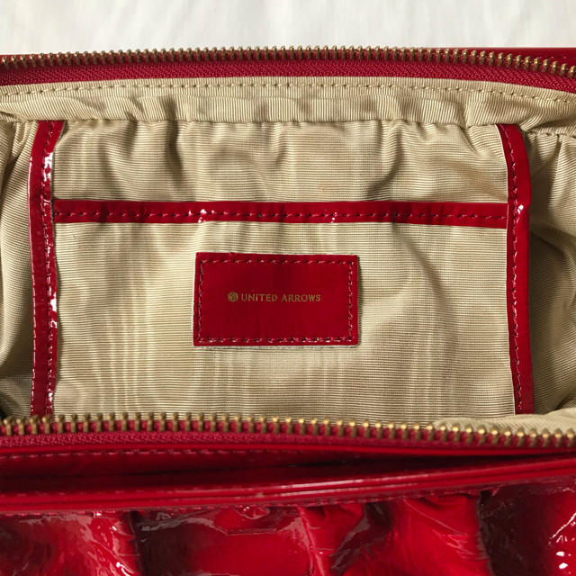 UNITED ARROWS(ユナイテッドアローズ)のUNITED ARROWS エナメル クラッチバッグ レディースのバッグ(クラッチバッグ)の商品写真