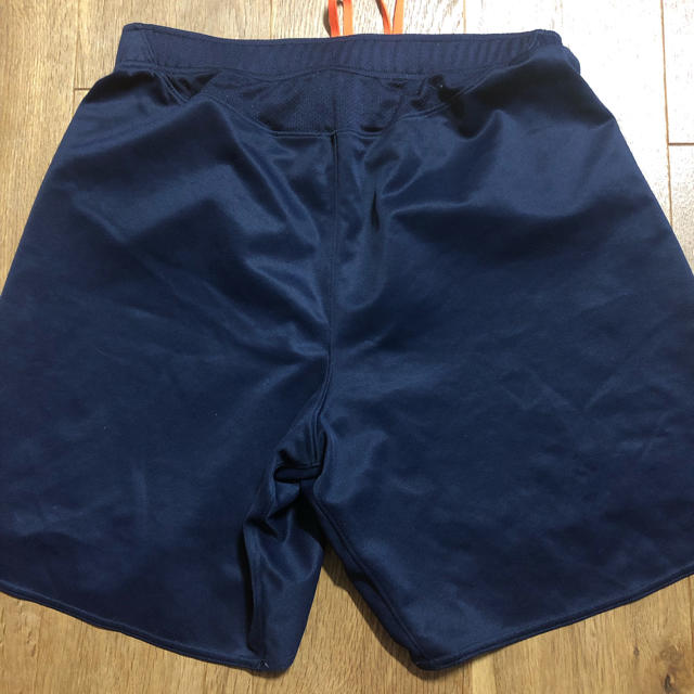 UNDER ARMOUR(アンダーアーマー)のアンダーアーマー  ショートパンツ MD 紺 オレンジ ハーフパンツ 中古 メンズのパンツ(ショートパンツ)の商品写真