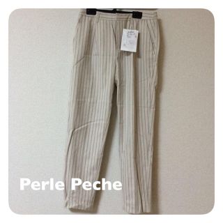 ペルルペッシュ(Perle Peche)のストライプ柄タックパンツ(カジュアルパンツ)