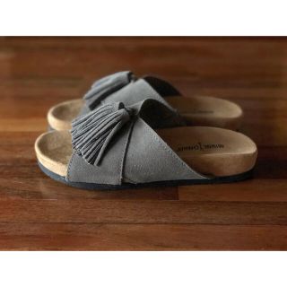 ミネトンカ(Minnetonka)のミネトンカ タッセル サンダル グレー us7 美品 minnetonka(サンダル)