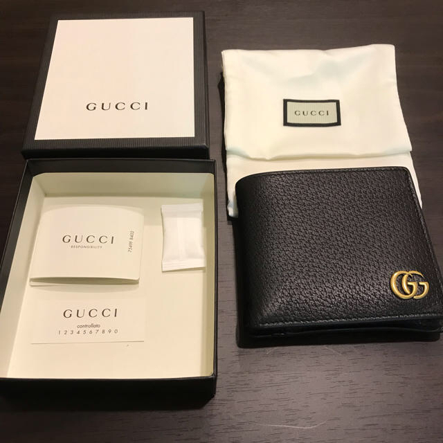 Gucci - 【送料無料】GUCCI二つ折り財布 小銭入れ有れの通販 by chan's shop｜グッチならラクマ