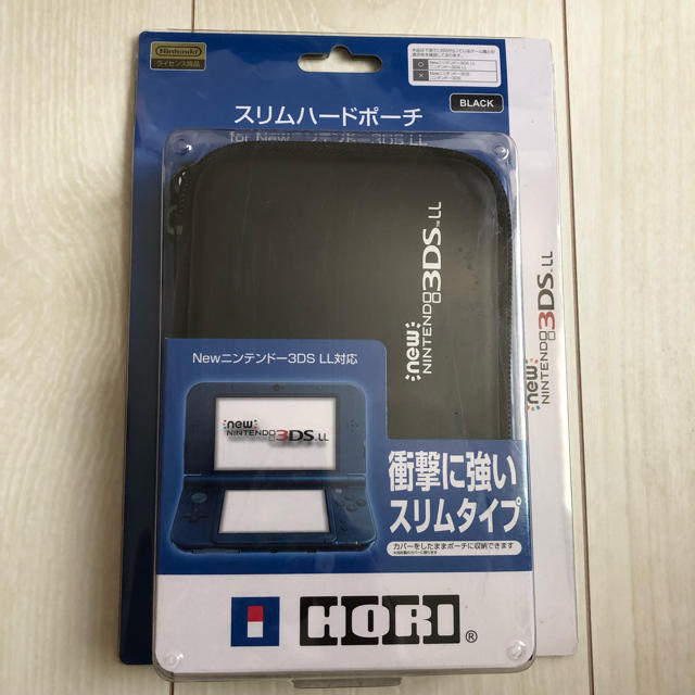 任天堂(ニンテンドウ)の新品【newニンテンドー3DSLL スリムハードポーチ】黒 エンタメ/ホビーのゲームソフト/ゲーム機本体(その他)の商品写真