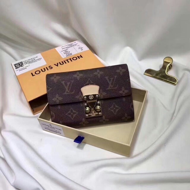 LOUIS VUITTON - LOUIS VUITTONつ折り財布の通販 by ウヒヲ's shop｜ルイヴィトンならラクマ