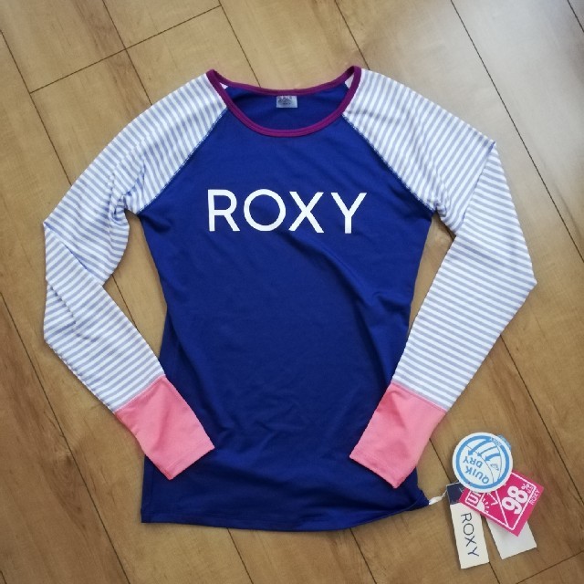 Roxy(ロキシー)のROXY　ロキシー　ラッシュガード　新品　レディースＬサイズ　サーフィン スポーツ/アウトドアのスポーツ/アウトドア その他(サーフィン)の商品写真